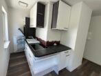 Modernisiertes 2-Zimmer-Eigentum mit Balkon in Frankfurt-Hausen - Küche