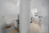 Schwellenfrei wohnen mit sonniger Dachterrasse mitten in Bad Vilbel - Gäste WC/Bad