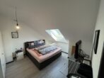 Gemütliches Dachgeschoss in Main-Nähe - Schlafzimmer